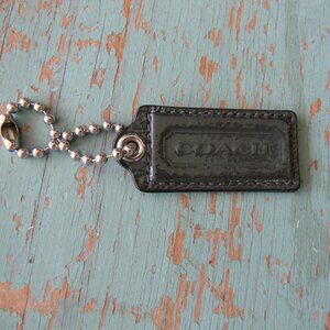 COACH DARK CHARCOAL GRAY PATENT LEATHER 2"LONG HANGTAG LOGO CHARM KEYRING KEY ,